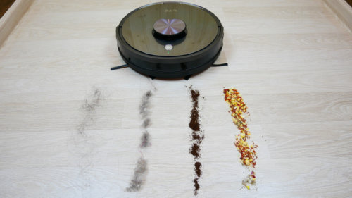 Robotas dulkių siurblys ir šiukšlės