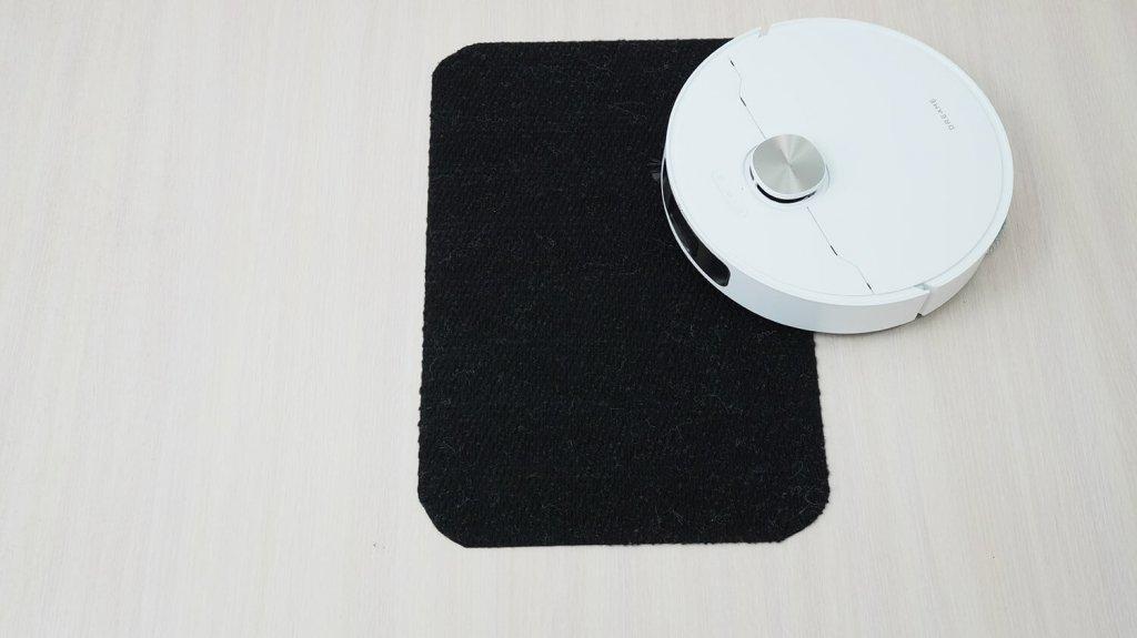 „DreameBot L10s Pro Ultra Heat“: važiavimas juodais paviršiais