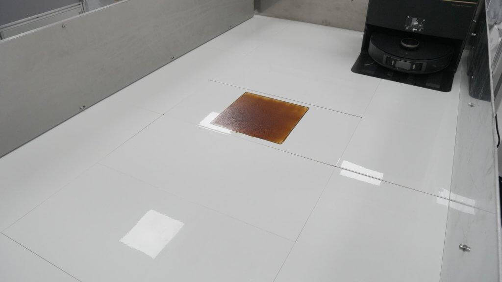 Dėmių šalinimo bandymas