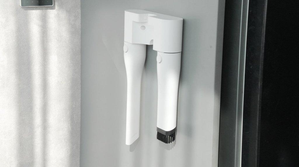 „Deerma T10W“: priedų laikymas laikiklyje