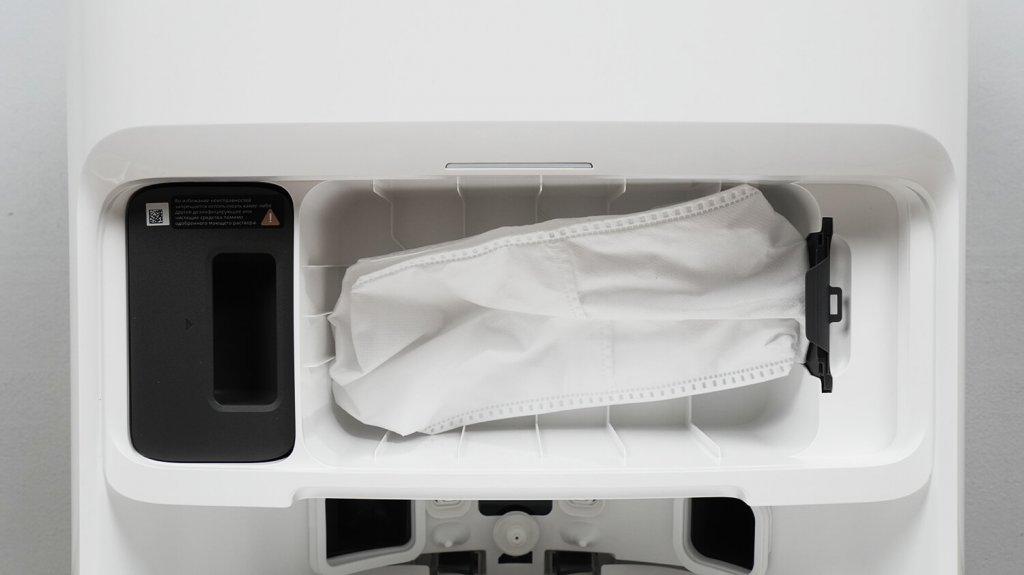 „Trouver V50 Ultra Complete“: maišelio ir ploviklio dozatoriaus vieta